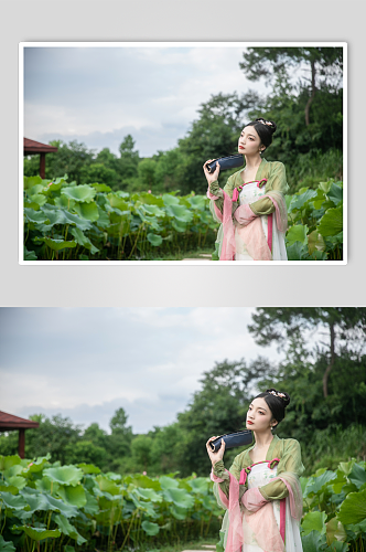 夏季荷花池中汉服女性人物摄影图片