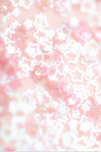 樱花色闪粉亮片质感纹理背景摄影图片