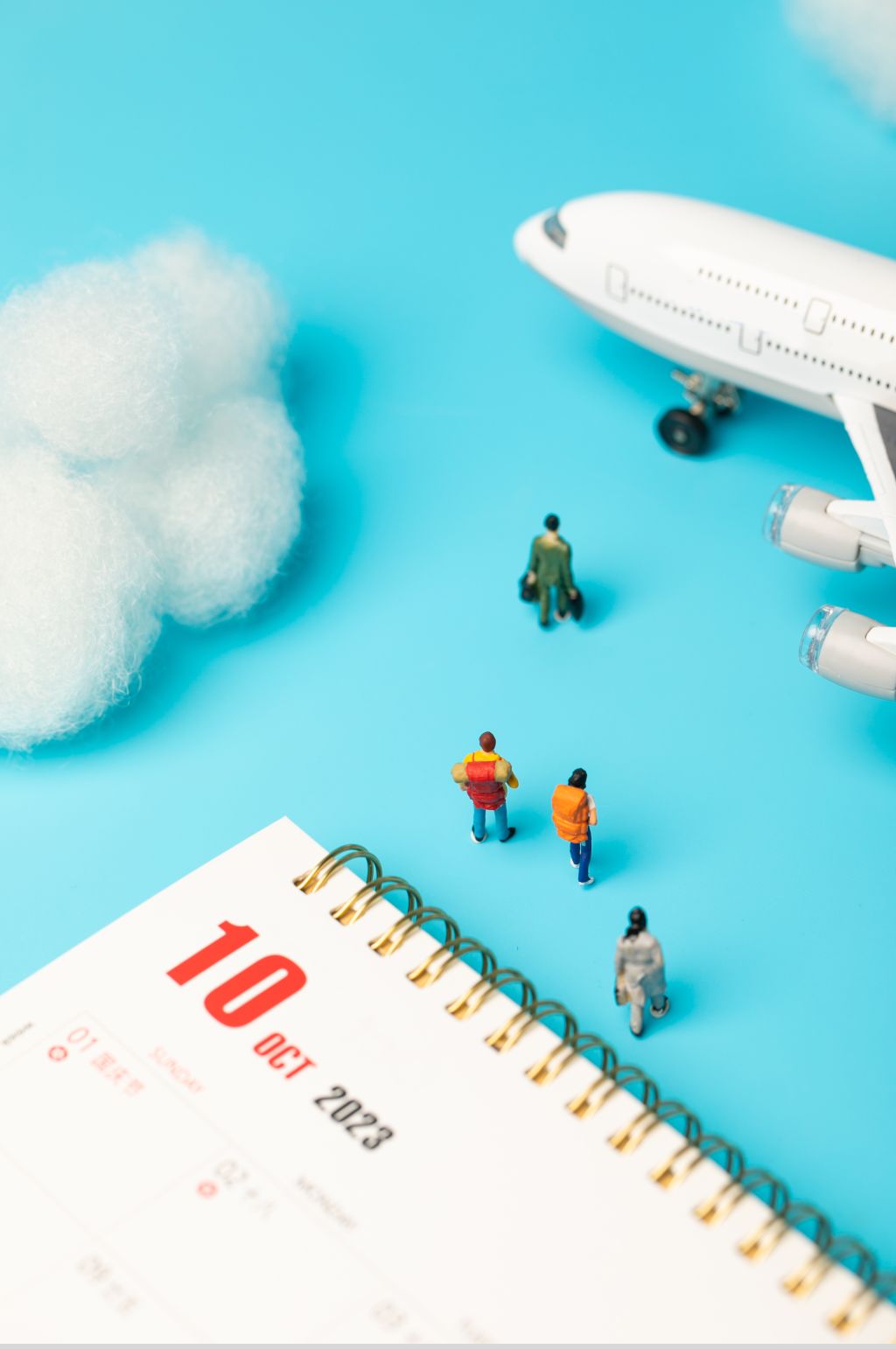 创意微缩小人出行旅游飞机摄影图片素材