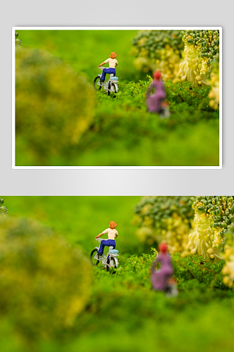 绿色出行微缩小人旅游骑行摄影图片