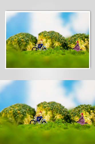 绿色出行微缩小人旅游骑行摄影图片