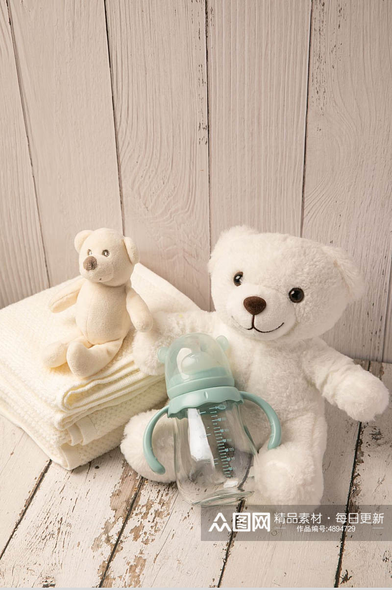叠毛巾玩具熊母婴用品摄影图片素材