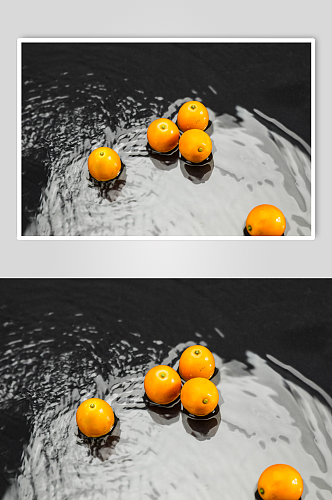 水面新鲜金橘金桔水果鲜果摄影图片