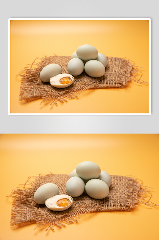 黄色背景咸鸭蛋蛋黄美食食物摄影图片