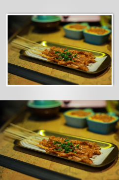 烤鸭肠鸭脚煲美食摄影图片