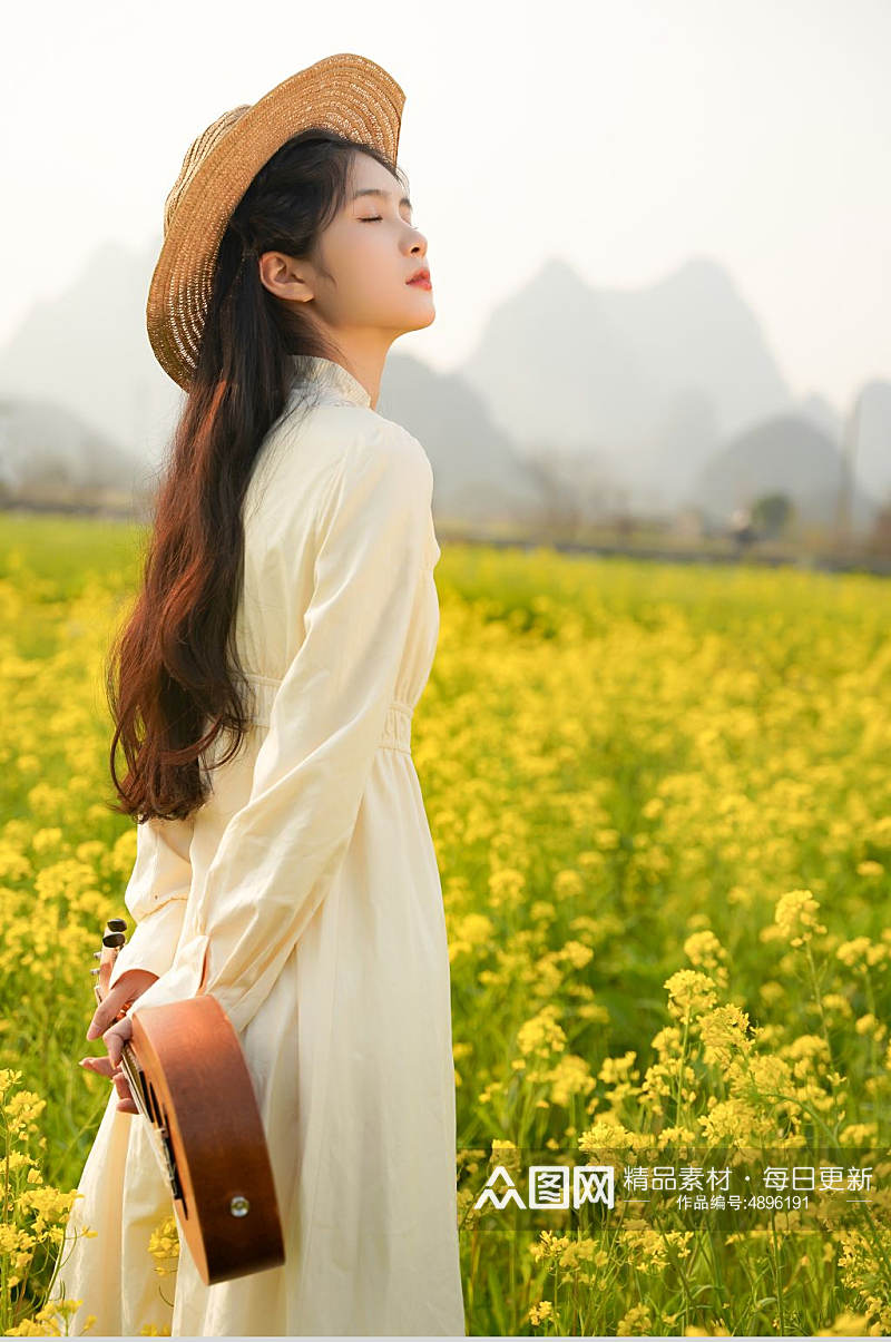 清新女孩身穿裙子油菜花人物摄影图片素材