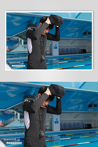 夏日男生手拿泳帽游泳男教练人物摄影图片