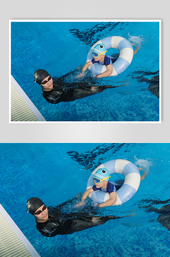 夏日小孩背漂游泳男教练人物摄影图片