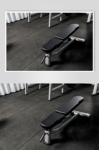 健身房锻炼器械卧推哑铃凳摄影图片