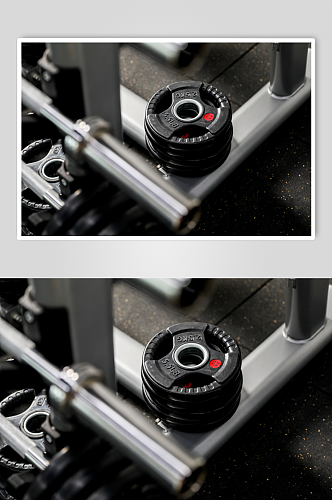 哑铃片举重哑铃健身房锻炼器械摄影图片