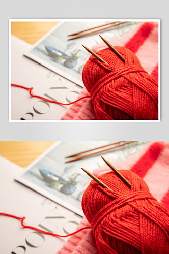 红色毛线团针织刺绣针线摄影图片