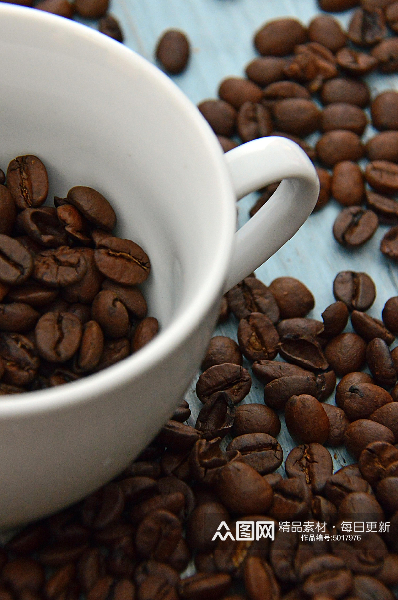 创意咖啡豆咖啡杯摄影素材