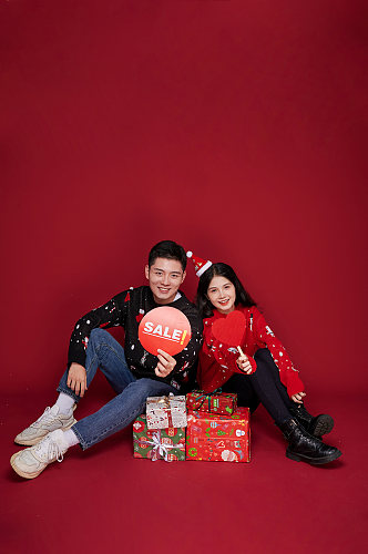 促销惊喜礼盒新年圣诞节情侣人物摄影图片