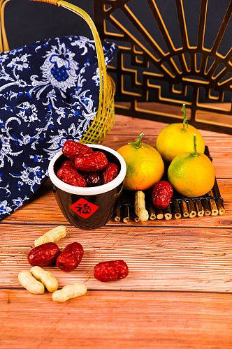 橙子茶具大枣春节物品元素背景摄影图片