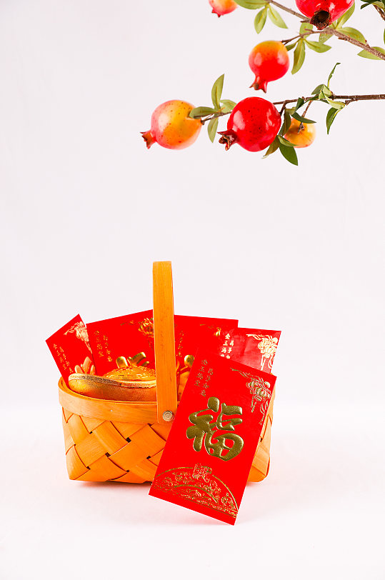新年红包篮子石榴春节物品元素背景摄影图片