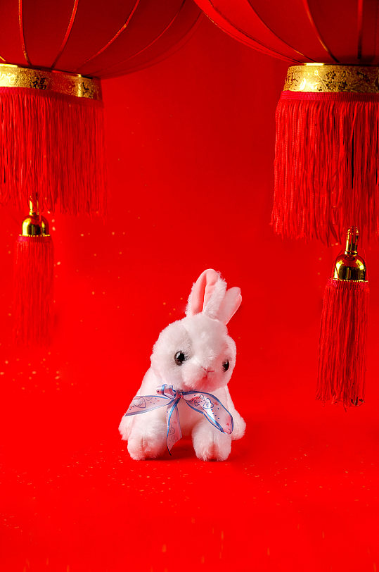 兔年兔子玩偶春节物品元素背景摄影图片