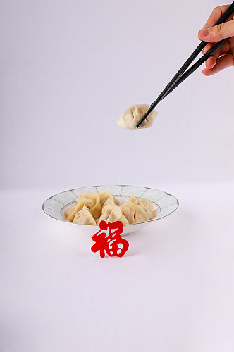 新年饺子春节物品元素背景摄影图片