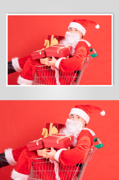 坐在购物车里送礼物的圣诞老人摄影图
