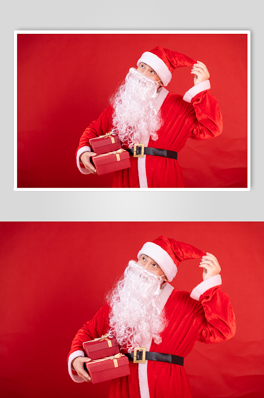 红色背景上的圣诞老人摄影图