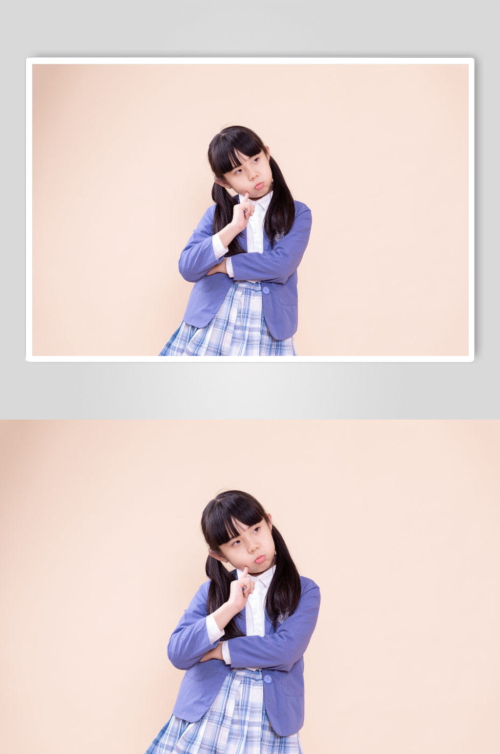 女孩思考问题的小学生摄影图素材