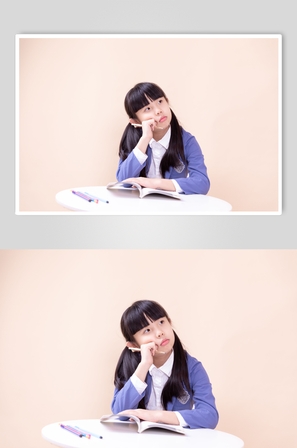 思考问题的小女孩小学生摄影图素材