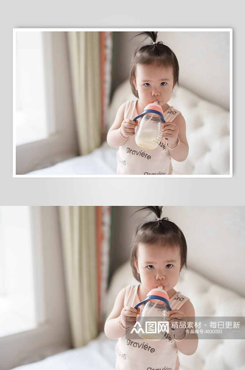 拿着奶瓶喝奶的小宝宝人人物摄影图素材