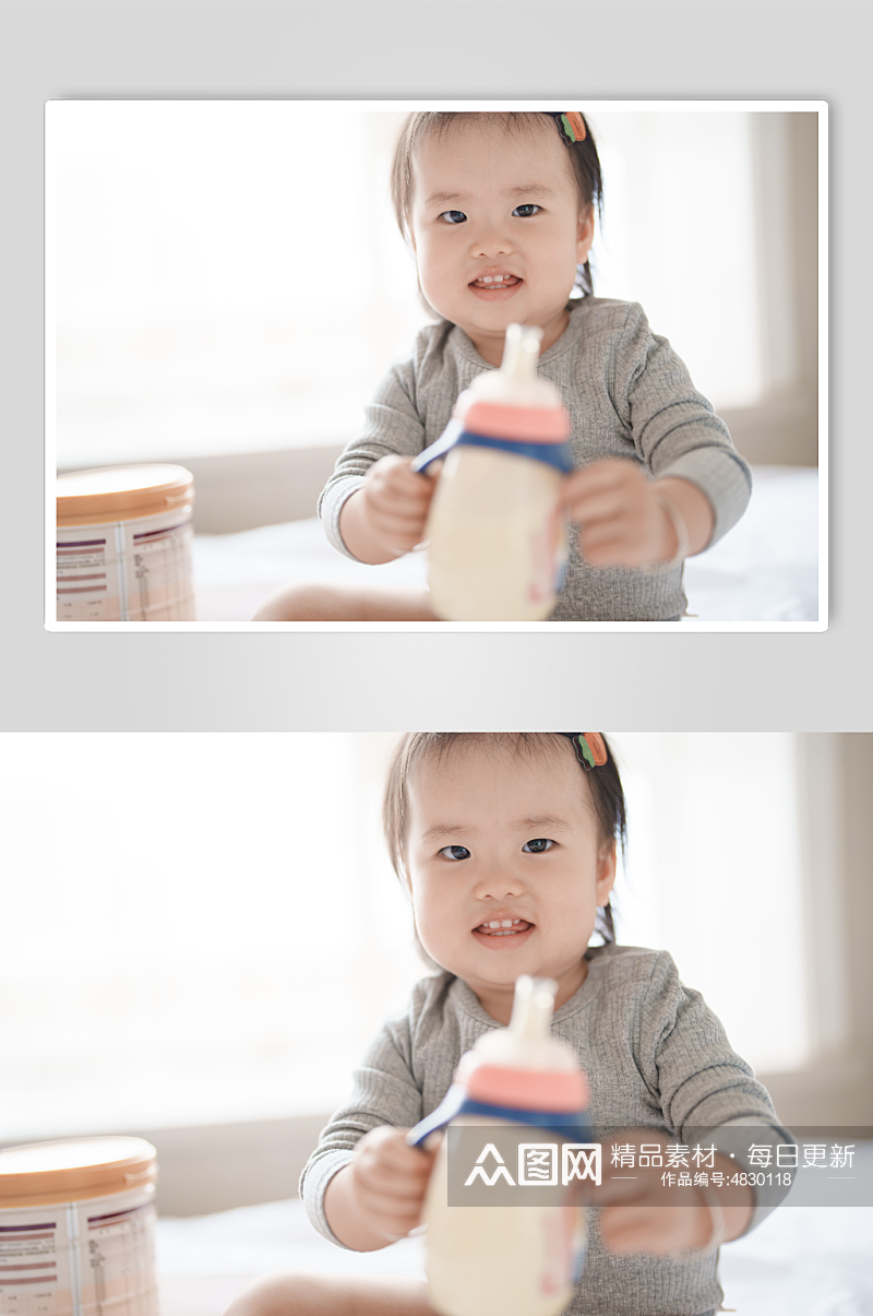 拿着奶瓶喝奶粉的小宝宝人物摄影图素材