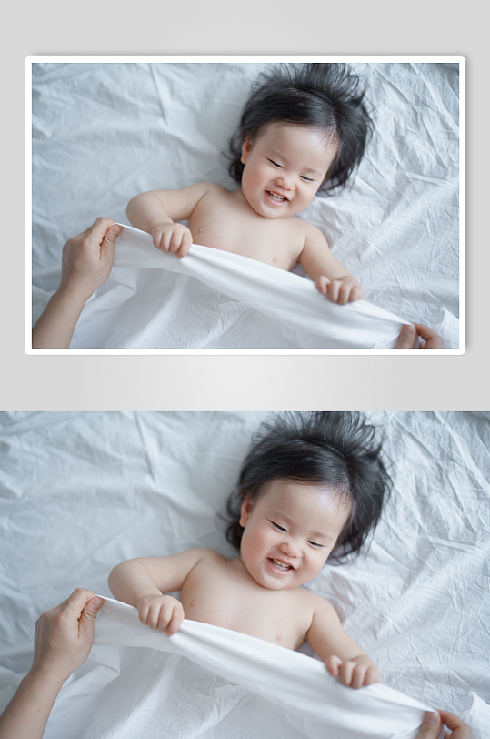 温馨盖被子的婴幼儿摄影图