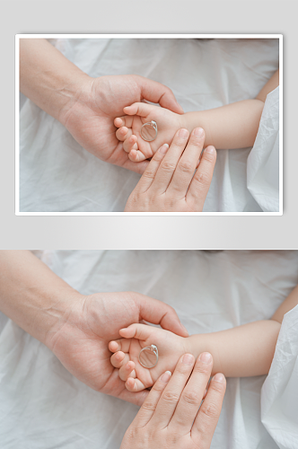 温馨婴幼儿手部摄影图