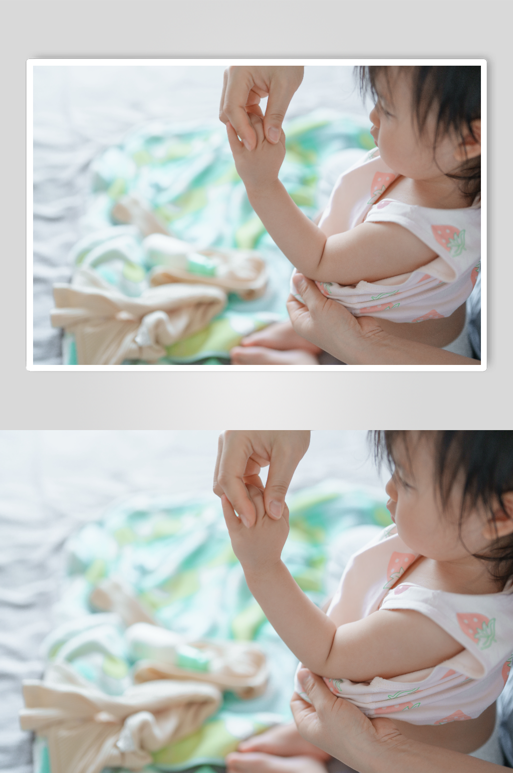 温馨婴幼儿穿衣服摄影图片素材