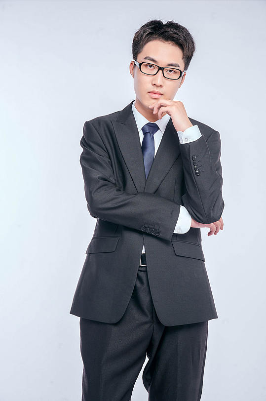 托腮成功西装男士商务职业人物摄影图片