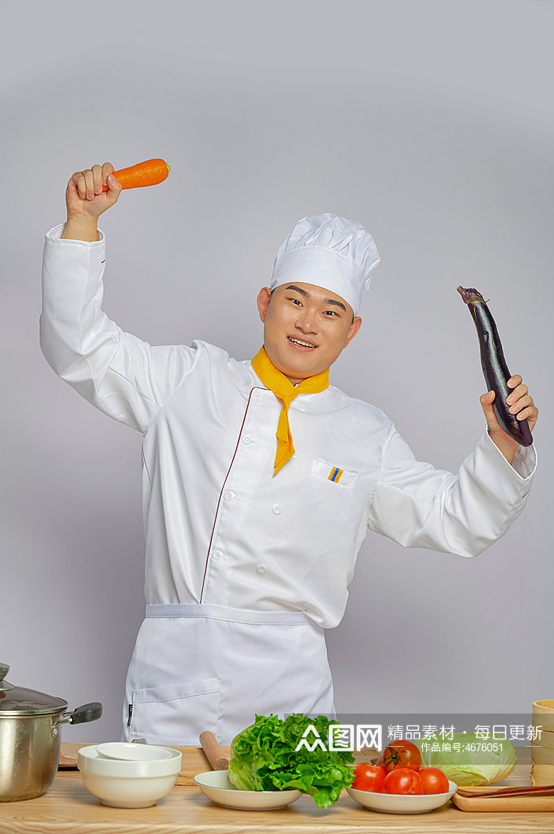 餐饮职场厨师服人物拿茄子胡萝卜摄影图片素材
