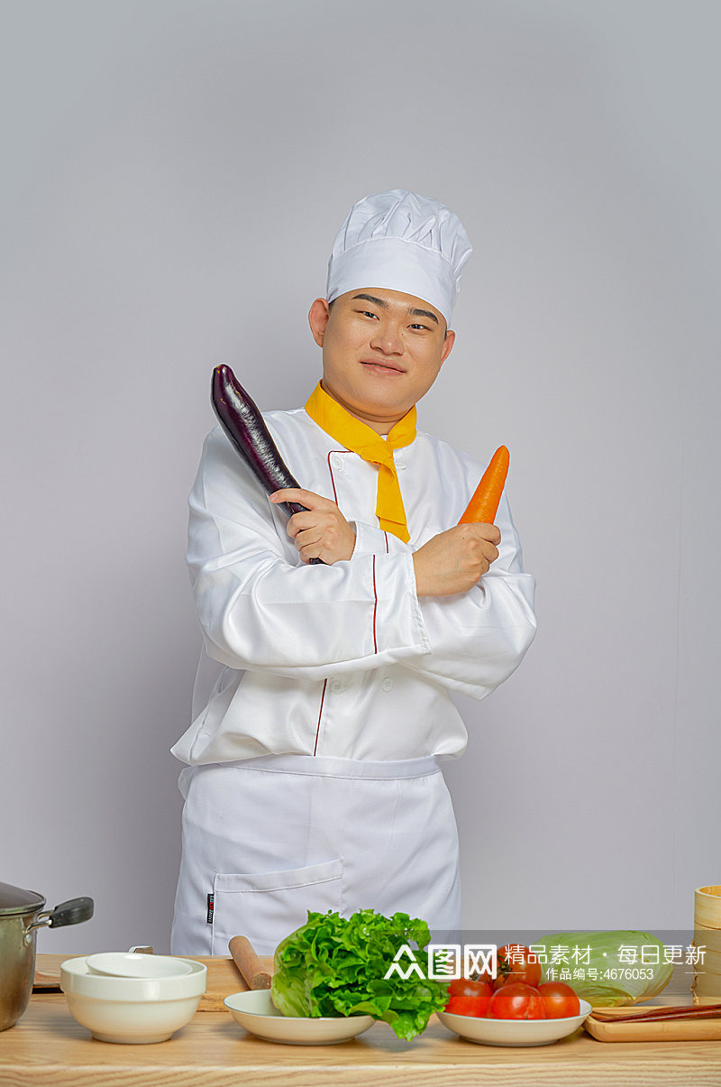 餐饮职场厨师服人物拿茄子胡萝卜摄影图片素材