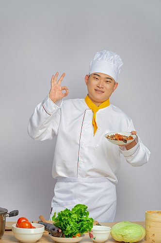 餐饮厨师服人物OK手势烤鸭摄影图片