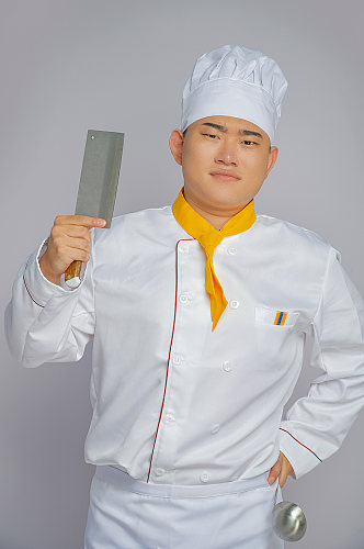 餐饮职场商业厨师服人物拿菜刀摄影图片
