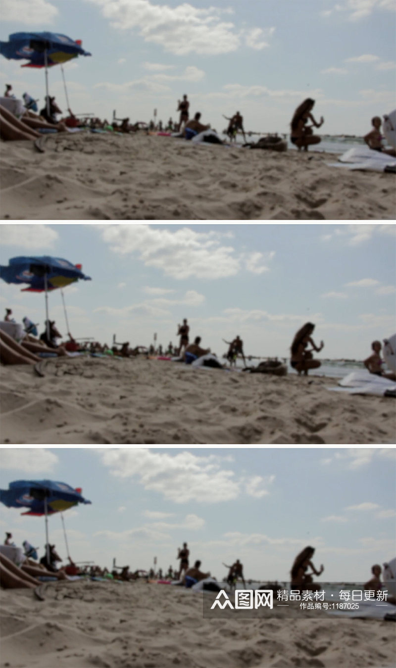 夏季人们在海滩上晒阳光浴素材