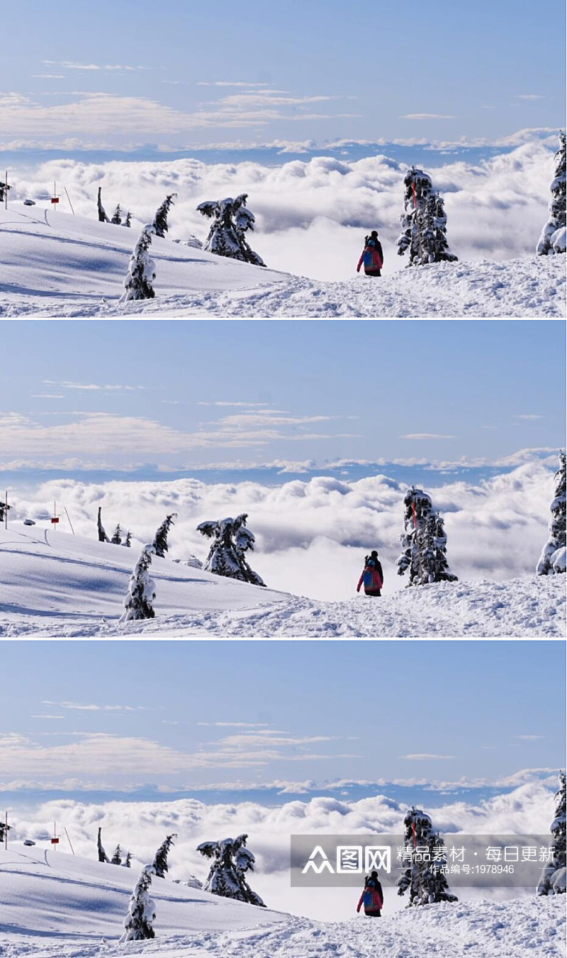 走在白雪皑皑的雪山山顶滑雪者素材