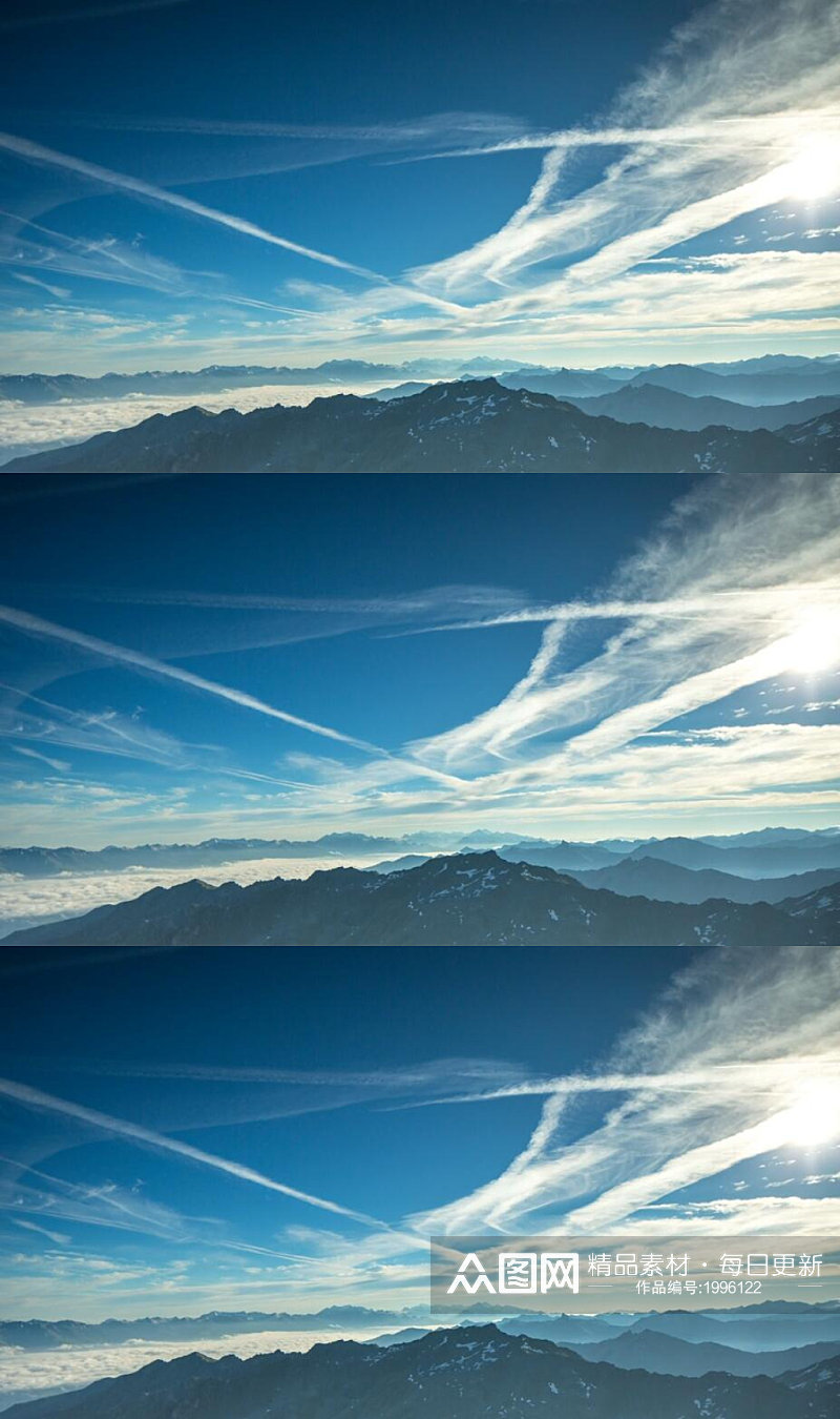 航拍蓝天白云下的雪山山峰视频素材 风景视频素材
