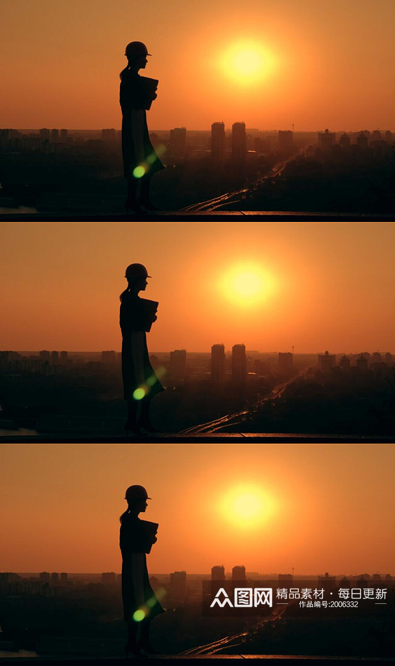 夕阳下实拍建筑房顶上女性工程师剪影视频素材
