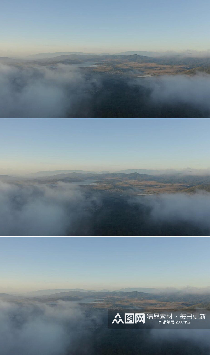 高空航拍云层下的高山湖泊小镇自然风景视频素材