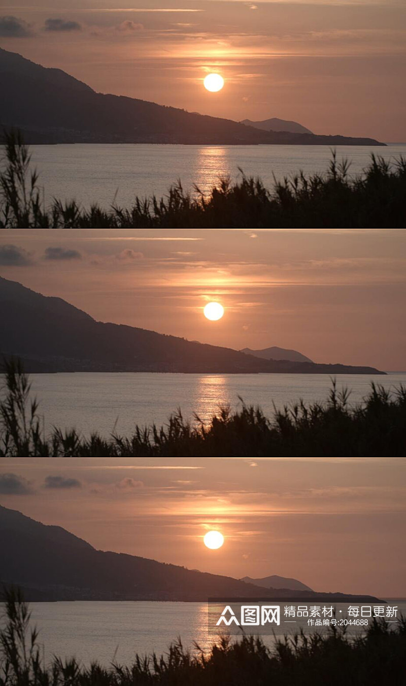 在海岸的红色日落太阳实拍素材