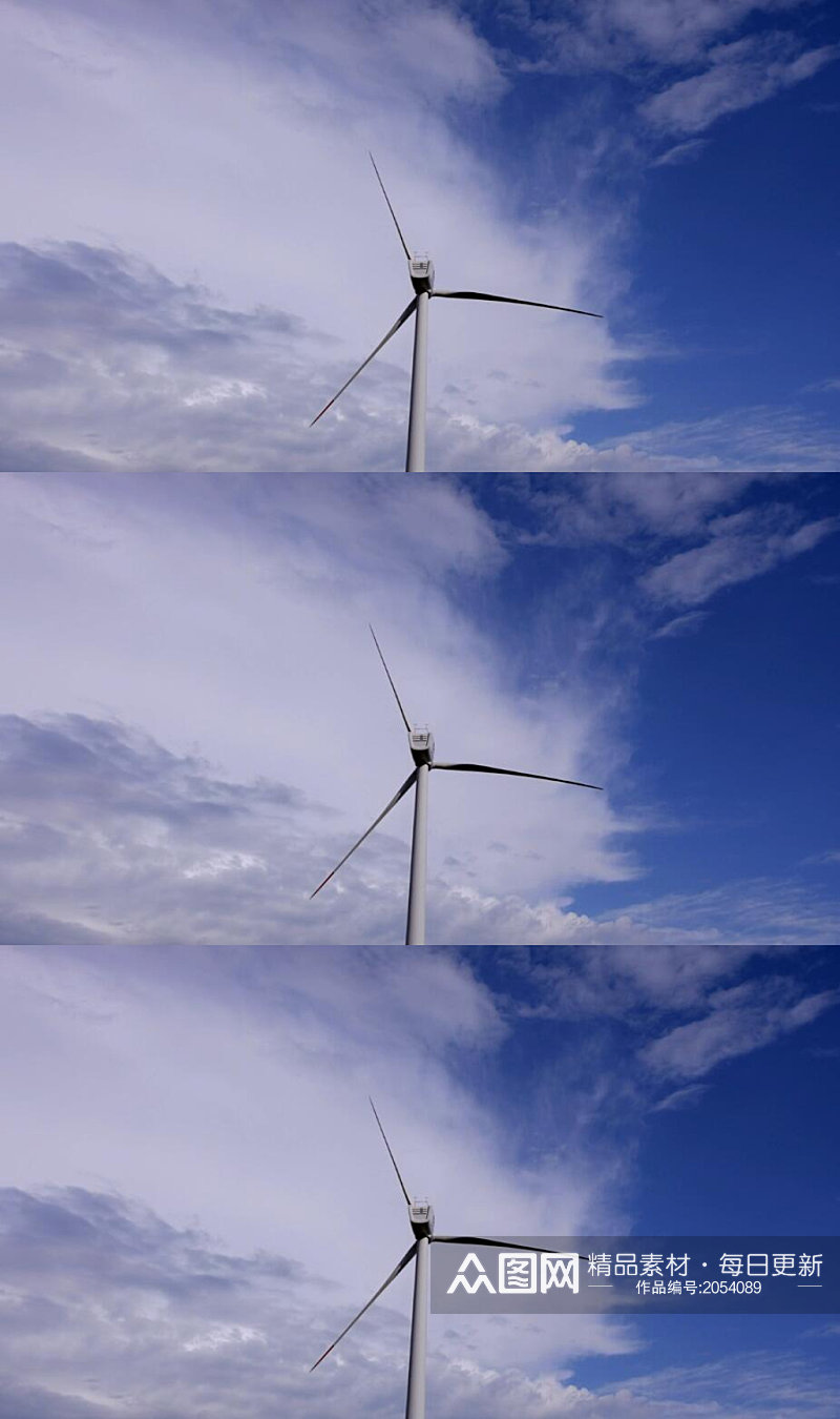 延时摄影蓝天白云下的风力涡轮机实拍素材
