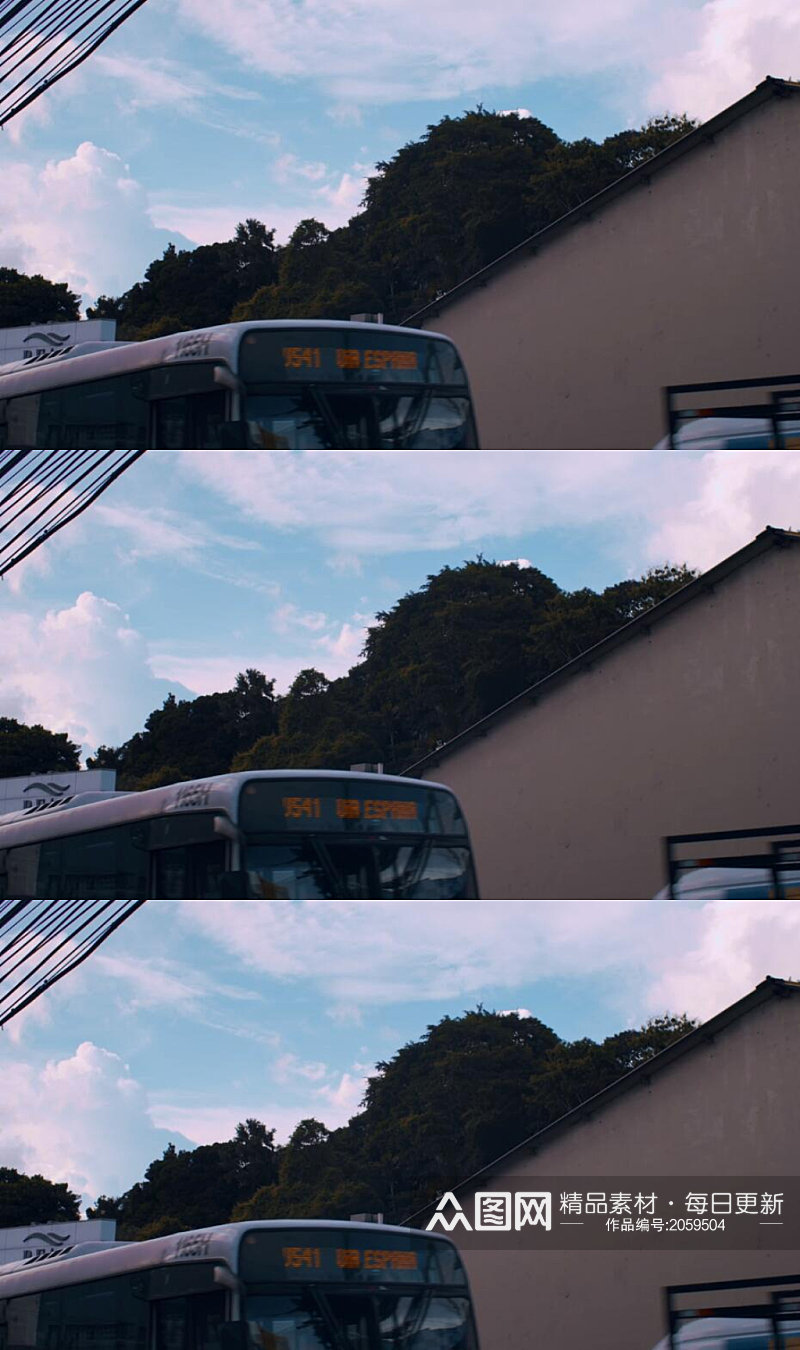 蓝天白云下的街道交通公车实拍素材