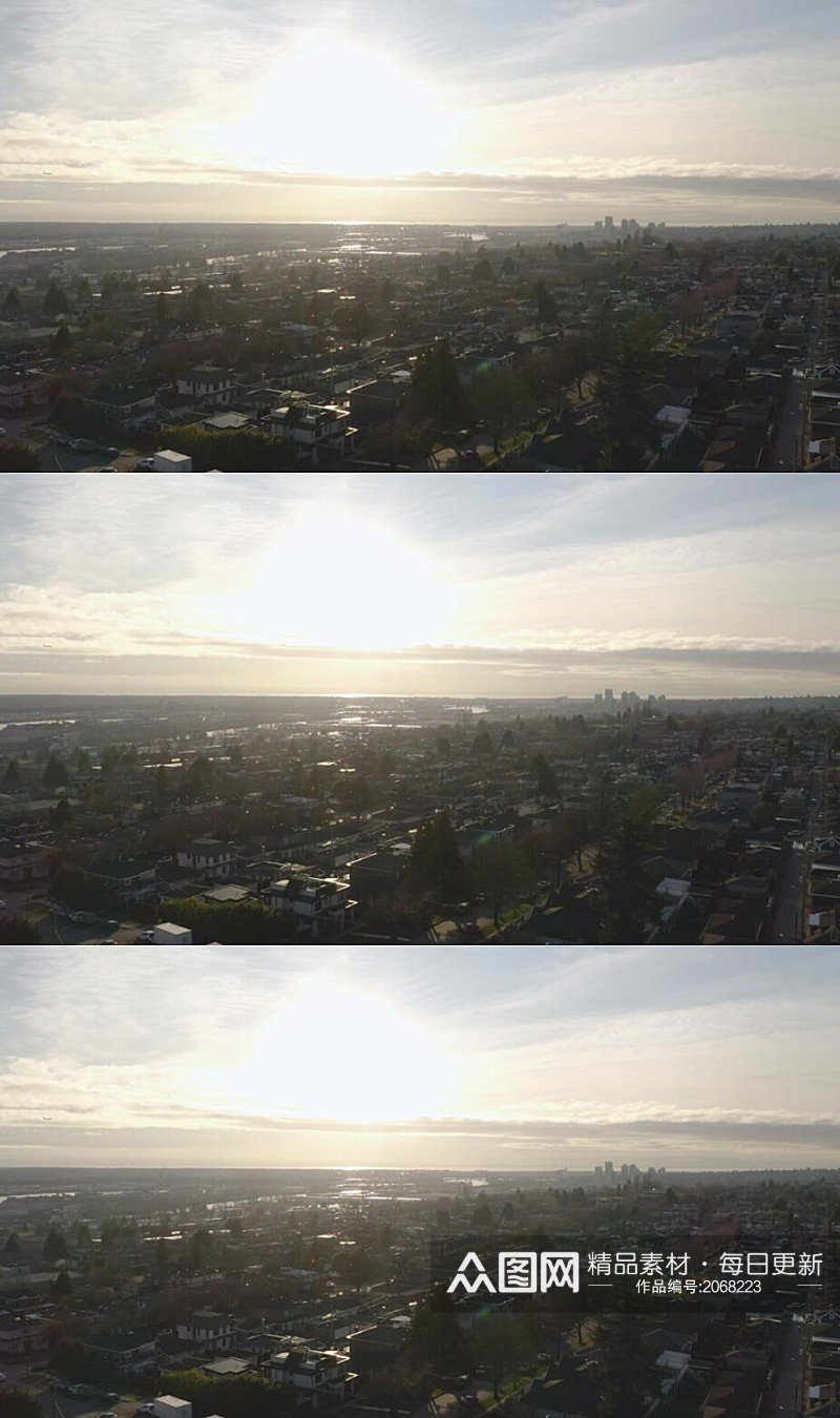 夕阳下太阳照耀城市全景实拍视频素材
