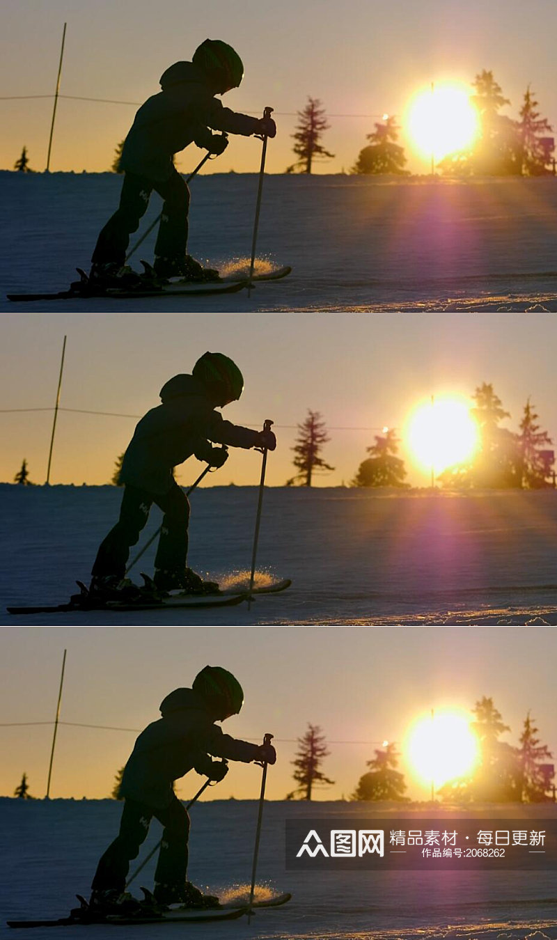 夕阳下在雪地上滑雪的男孩实拍视频素材