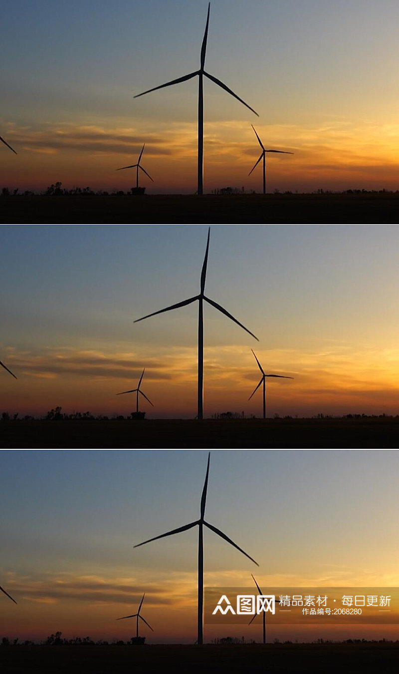日落黄昏下的风力涡轮发电机实拍视频素材