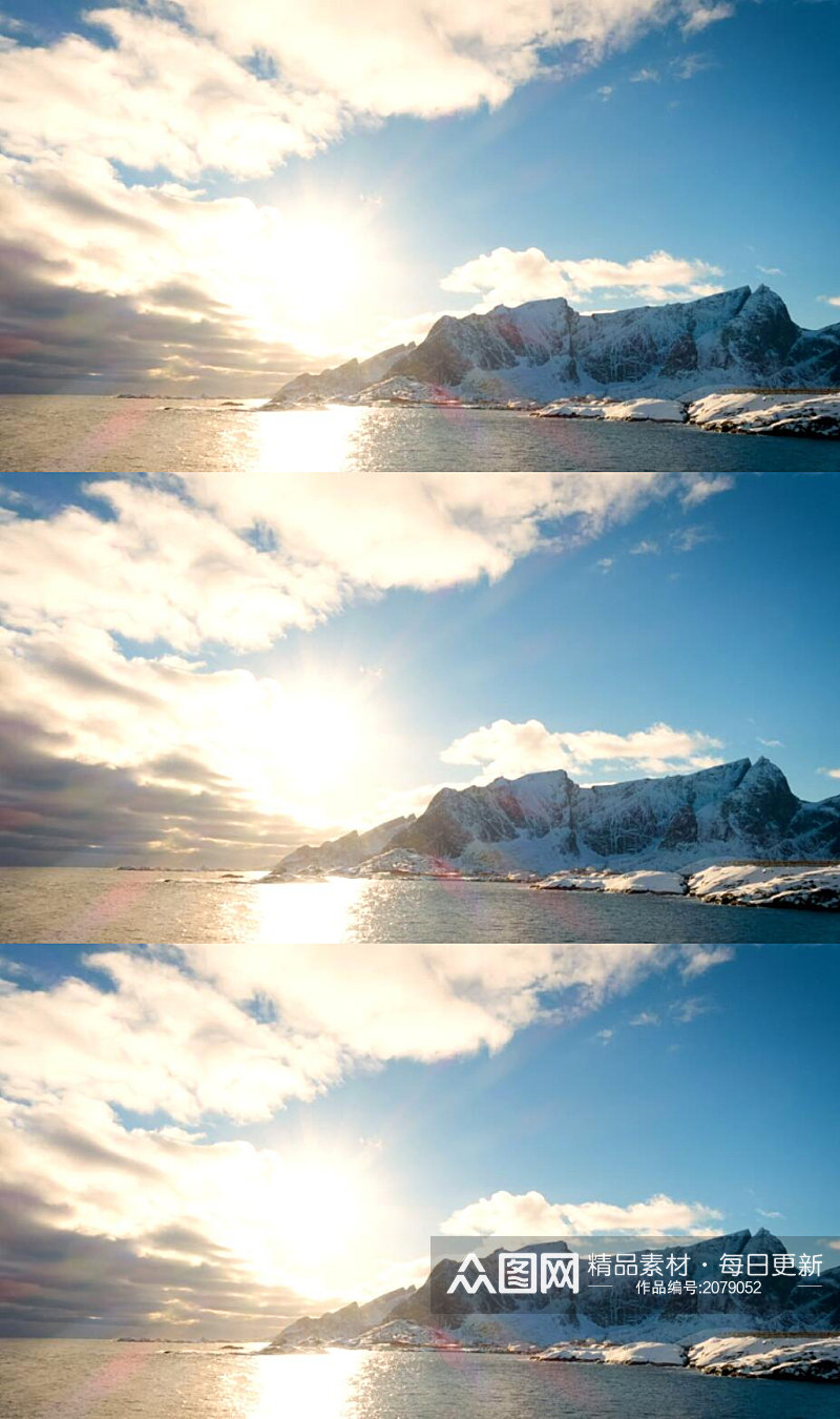 延时摄影清晨阳光大海旁的雪山美景实拍素材