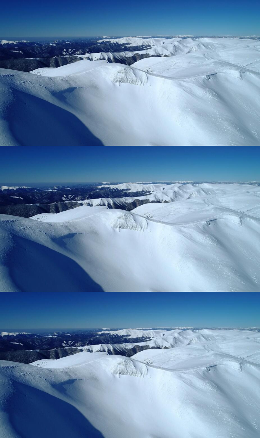 航拍蓝天下雪山山脉美景实拍素材