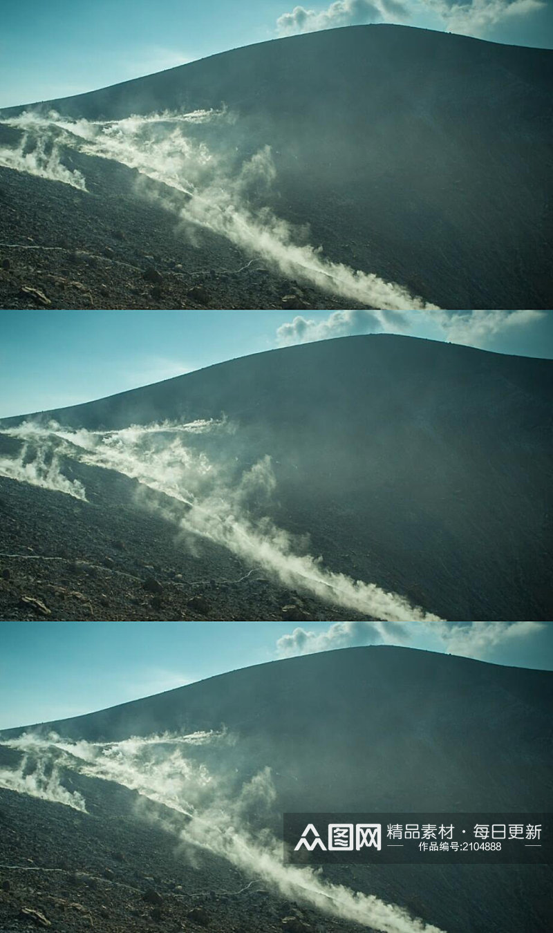 远处烟雾弥漫的岩石火山景色实拍素材