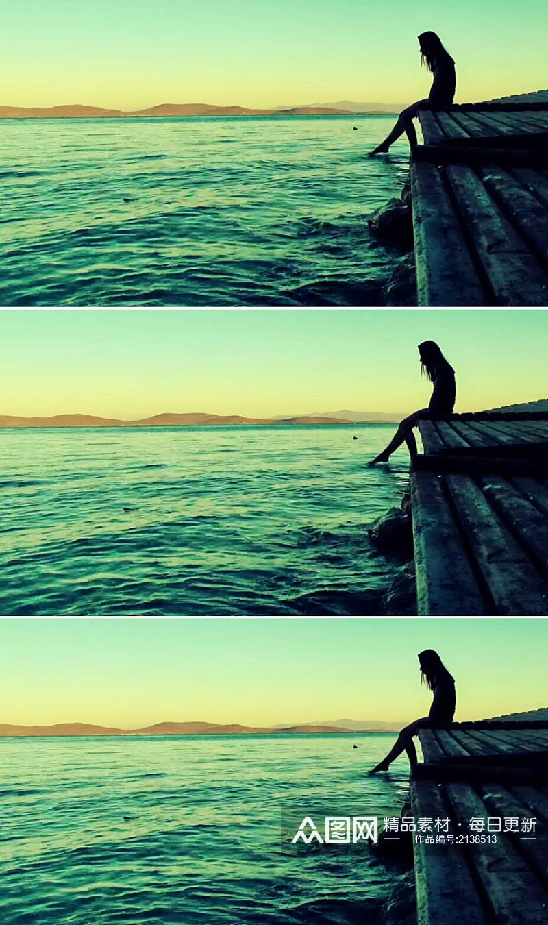 日落黄昏的大海码头边的美女剪影实拍素材素材